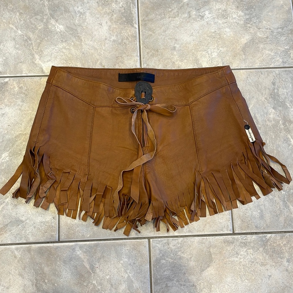One Teaspoon sold by Free People leather fringe shorts